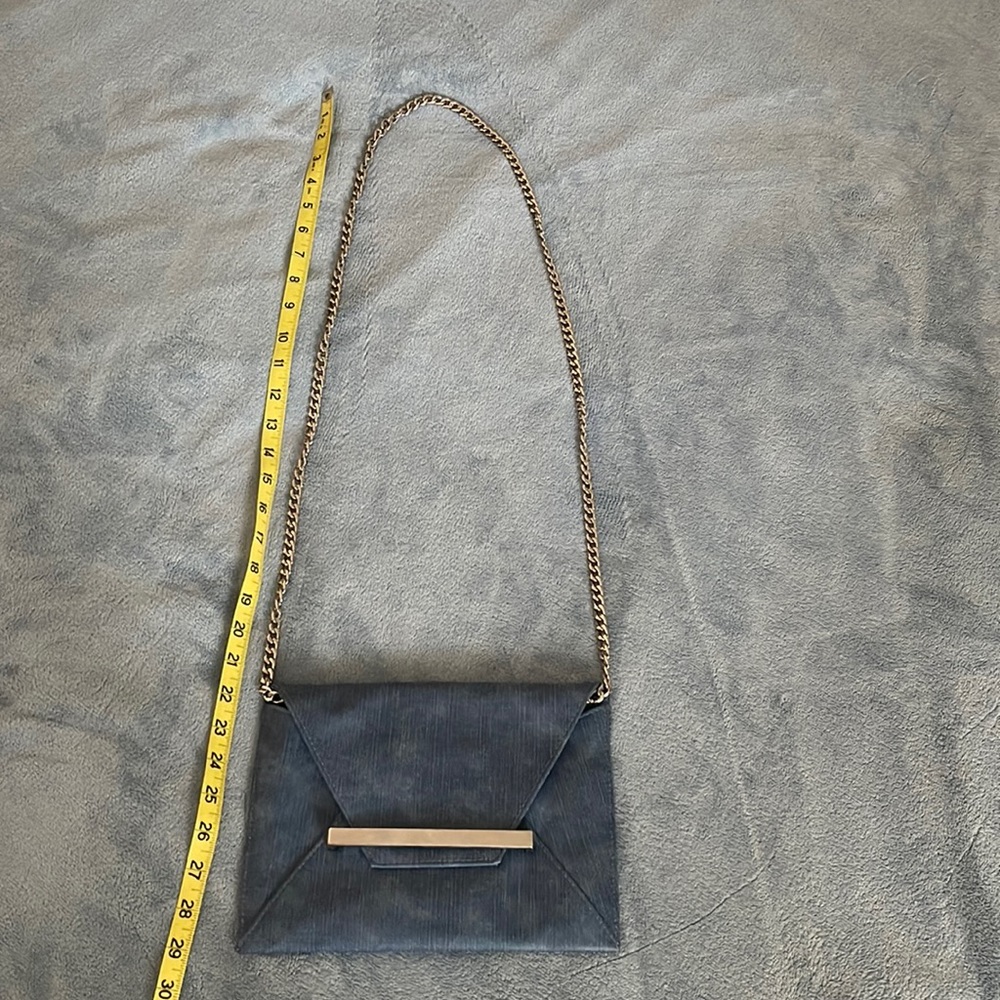 Denim look cross body bag with silver accents. Mossimo. Purse 9 1/2” by 7”.